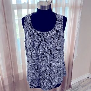Chicos block and white ruffle front tank top